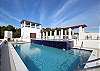 Custom Shared Pool with Decking & Fire Pit Custom Shared Pool with Decking & Fire Pit