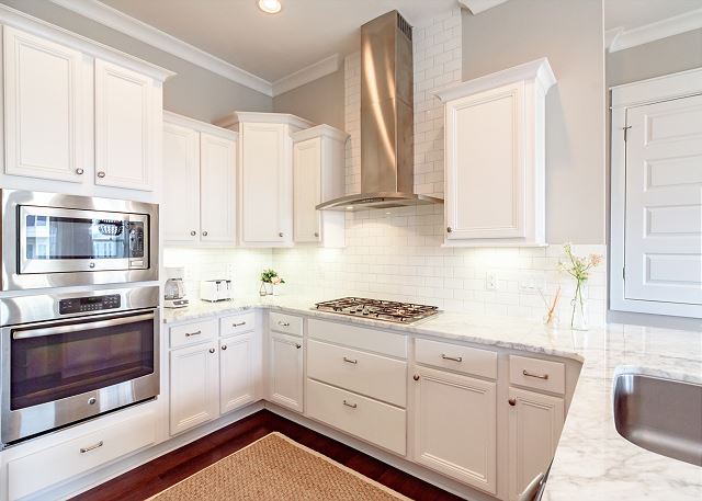 Gourmet Kitchen with Stainless Vent Hood Gourmet Kitchen with Stainless Vent Hood