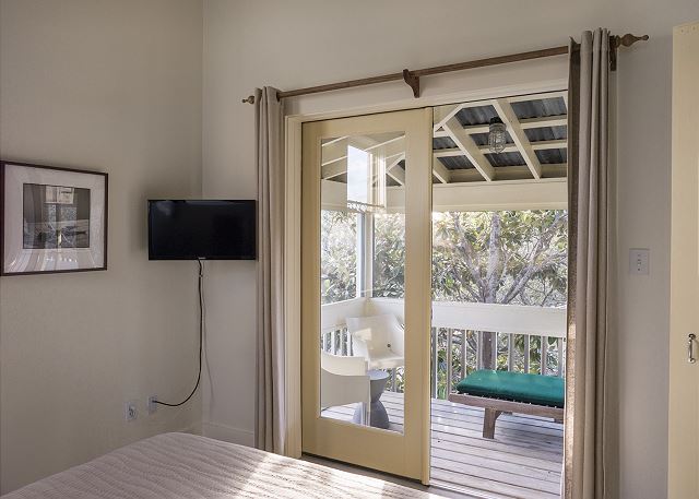 The front bedroom opens out to a private screened porch The front bedroom opens out to a private screened porch