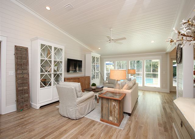 Open Living Room with Pool Views Open Living Room with Pool Views