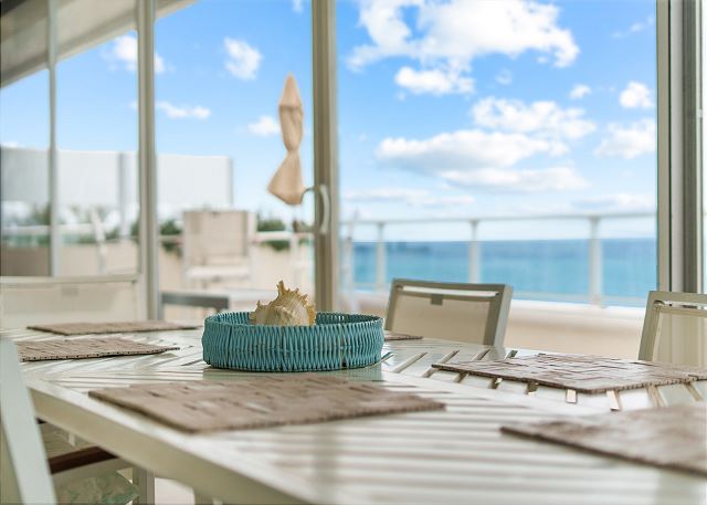 Outdoor Living / Dining Space with Direct Views of the Ocean