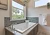 Primary King EnSuite Bathroom with Walk-in Shower and Soaking Tub