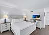 Loft king bed with adjoining bathroom and walk in shower