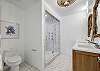 1st Guest Bedroom Off From Kitchen With King and Ensuite Bathroom With Shower