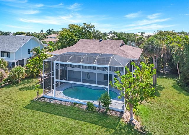A Sunset on the Rocks | Lake front East Rocks home with Saltwater Pool