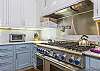 Gourmet cooking with a six burner gas range, 2 ovens, grill, pot filler and warming drawers