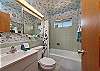 Hall bath with a shower/tub combo
