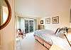 A Queen bed in the 2nd bedroom