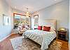 Lagoon-side Primary bedroom with a King bed