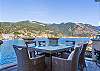 Al fresco dining on the upper lagoon side deck