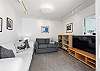 Sitting room with a TV off the livingroom
