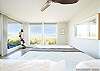 Main bedroom looks out to the dunes & ocean beyond