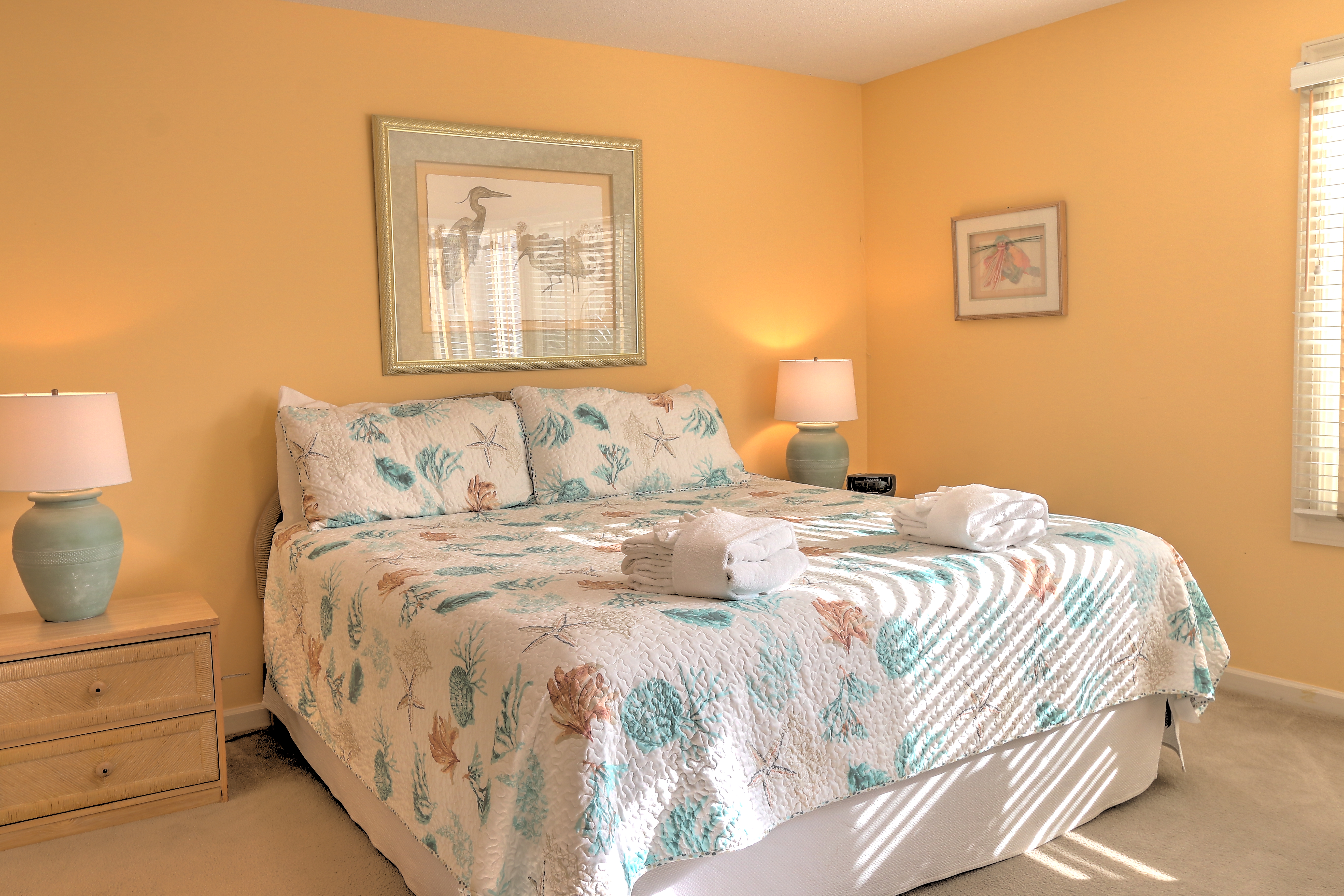 Master bedroom with King bed, flat screen TV, and private bath