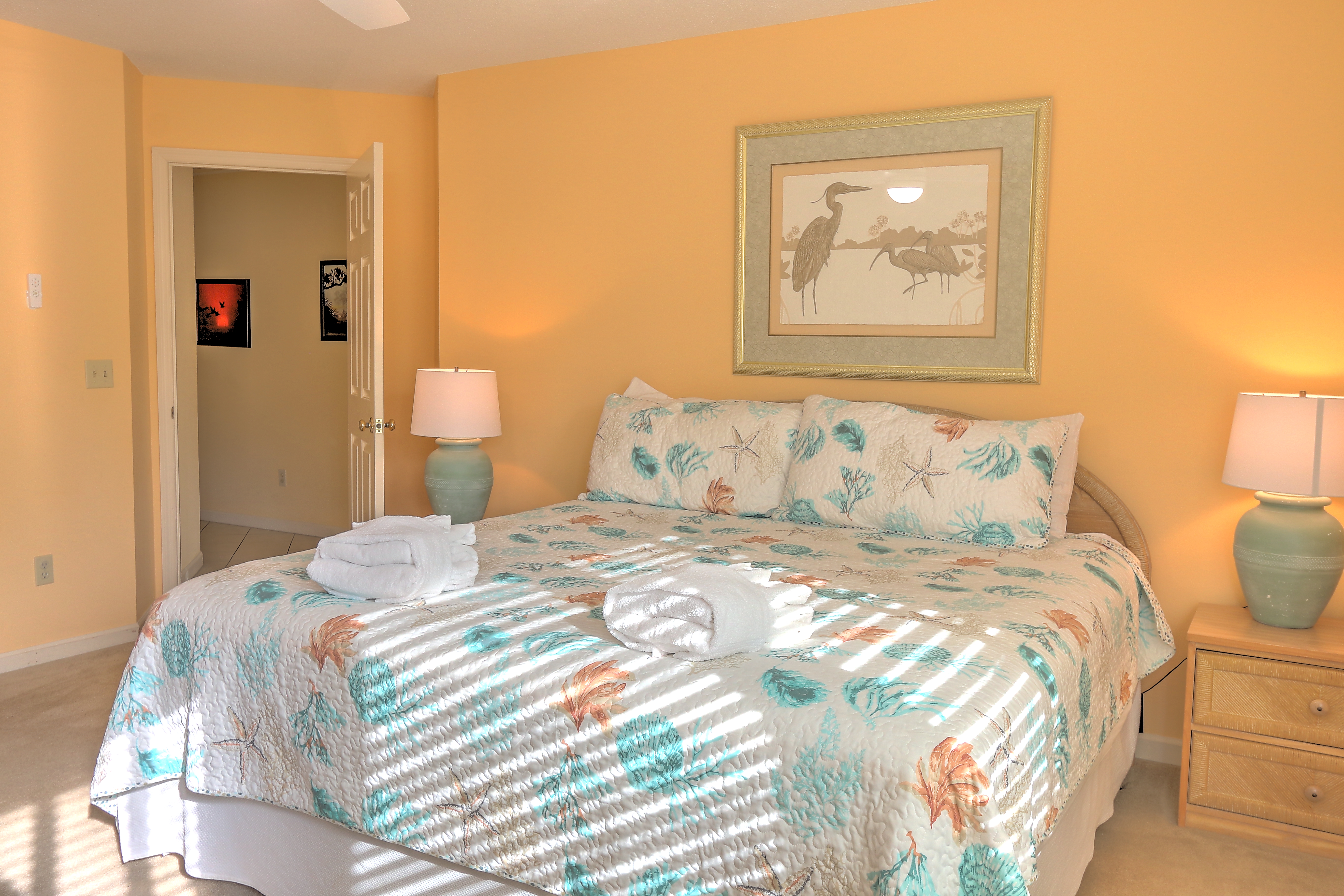 Master bedroom with King bed, flat screen TV, and private bath