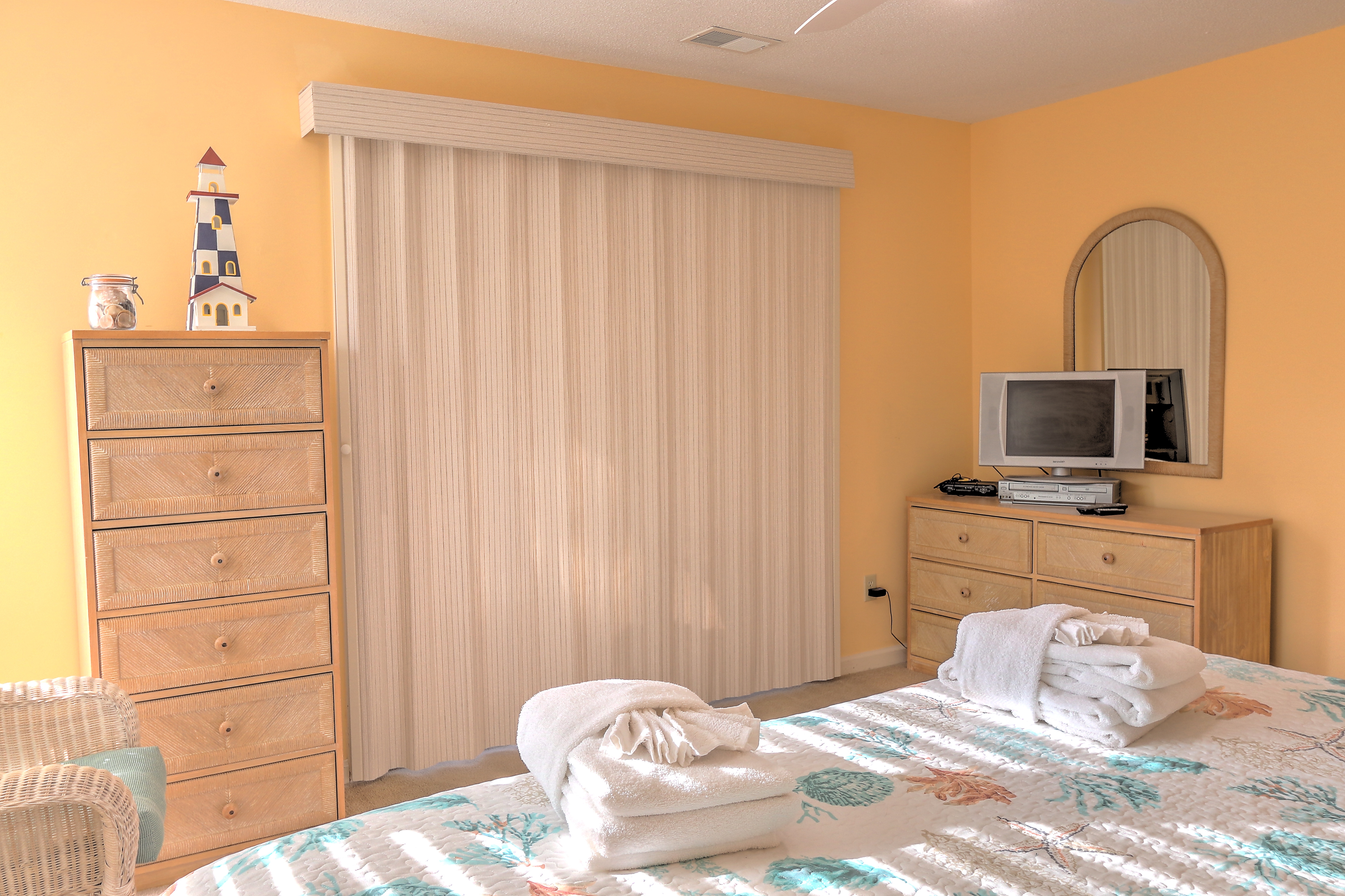 Master bedroom with King bed, flat screen TV, and private bath