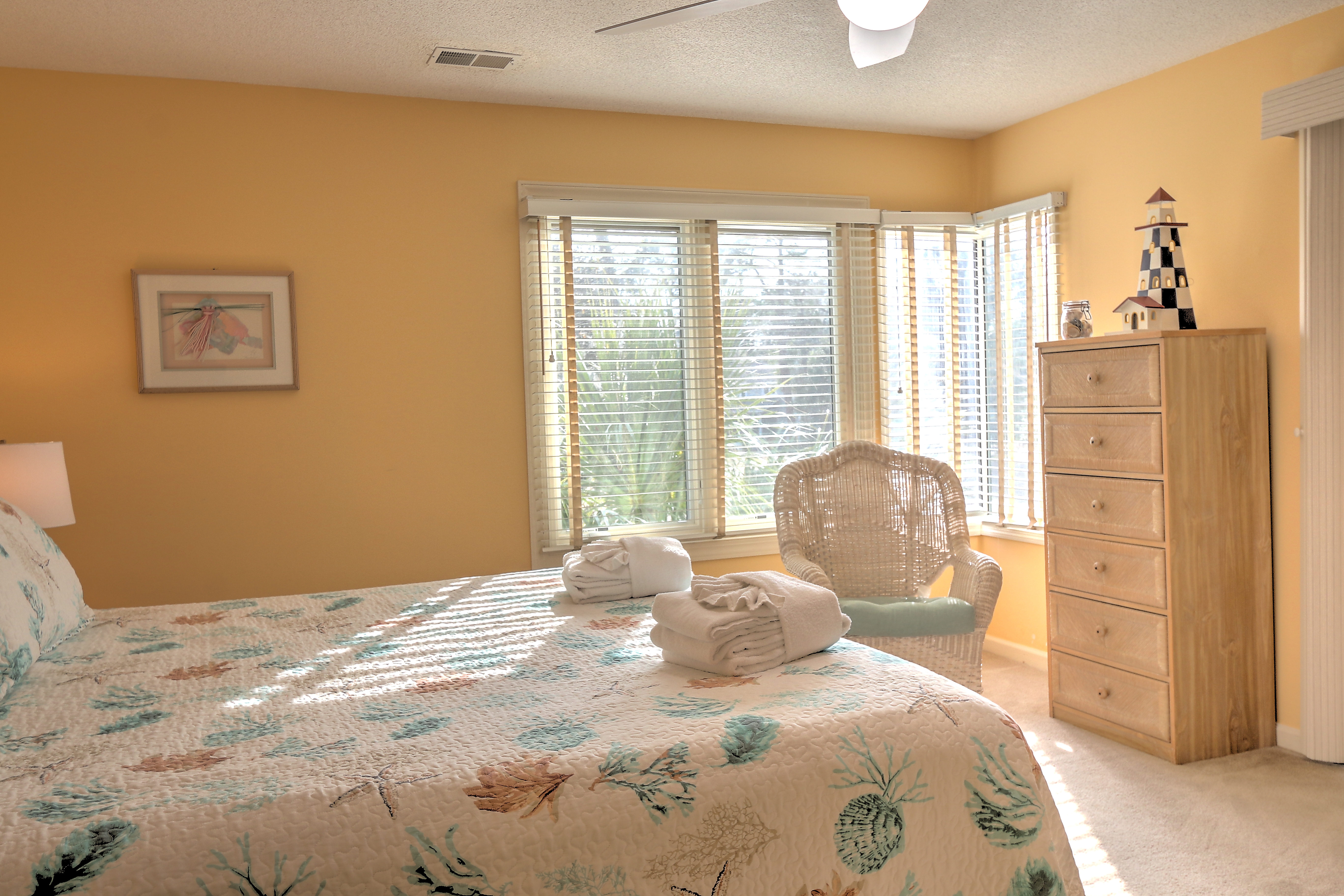 Master bedroom with King bed, flat screen TV, and private bath