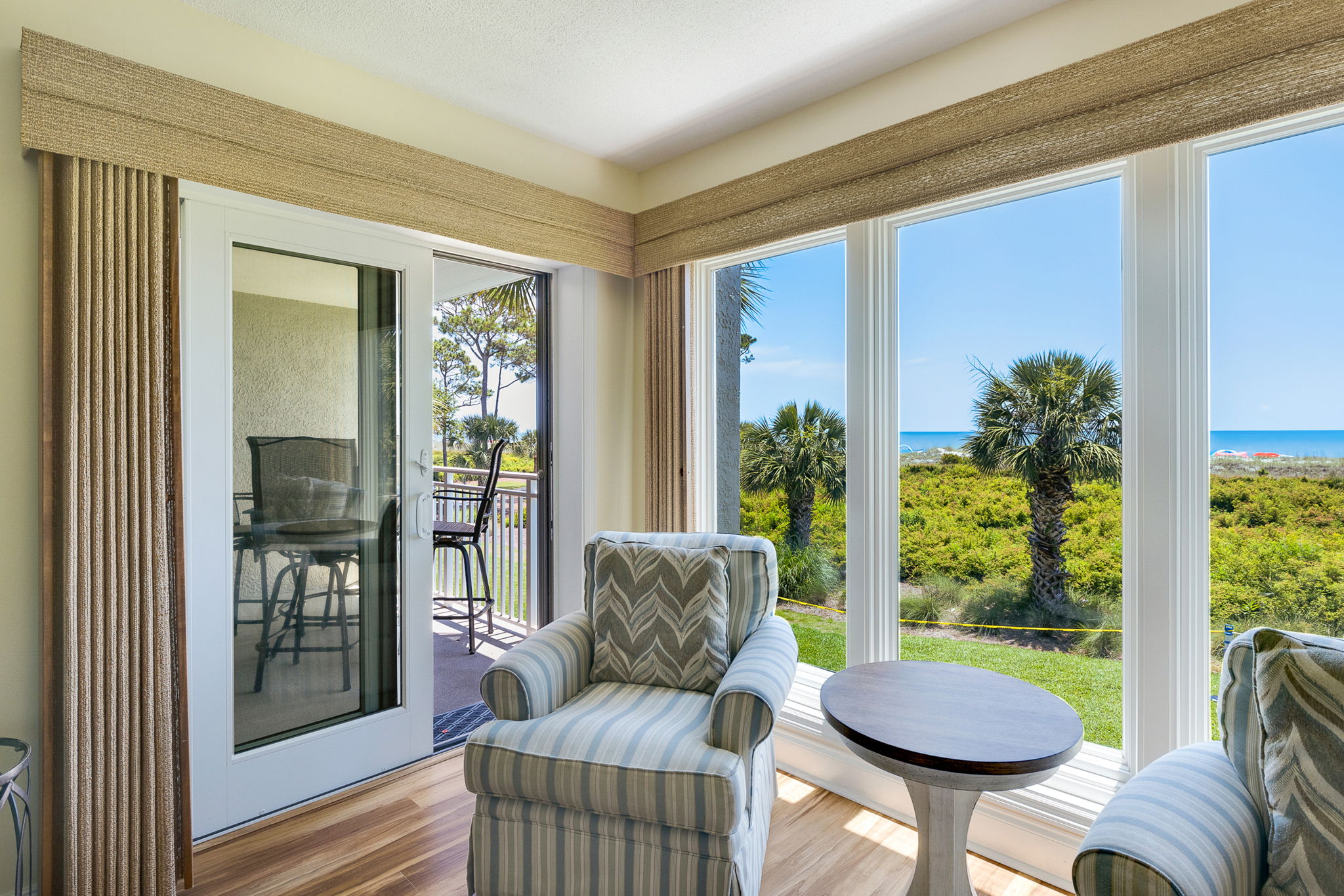 Living Room with Flat Screen TV and Ocean Views