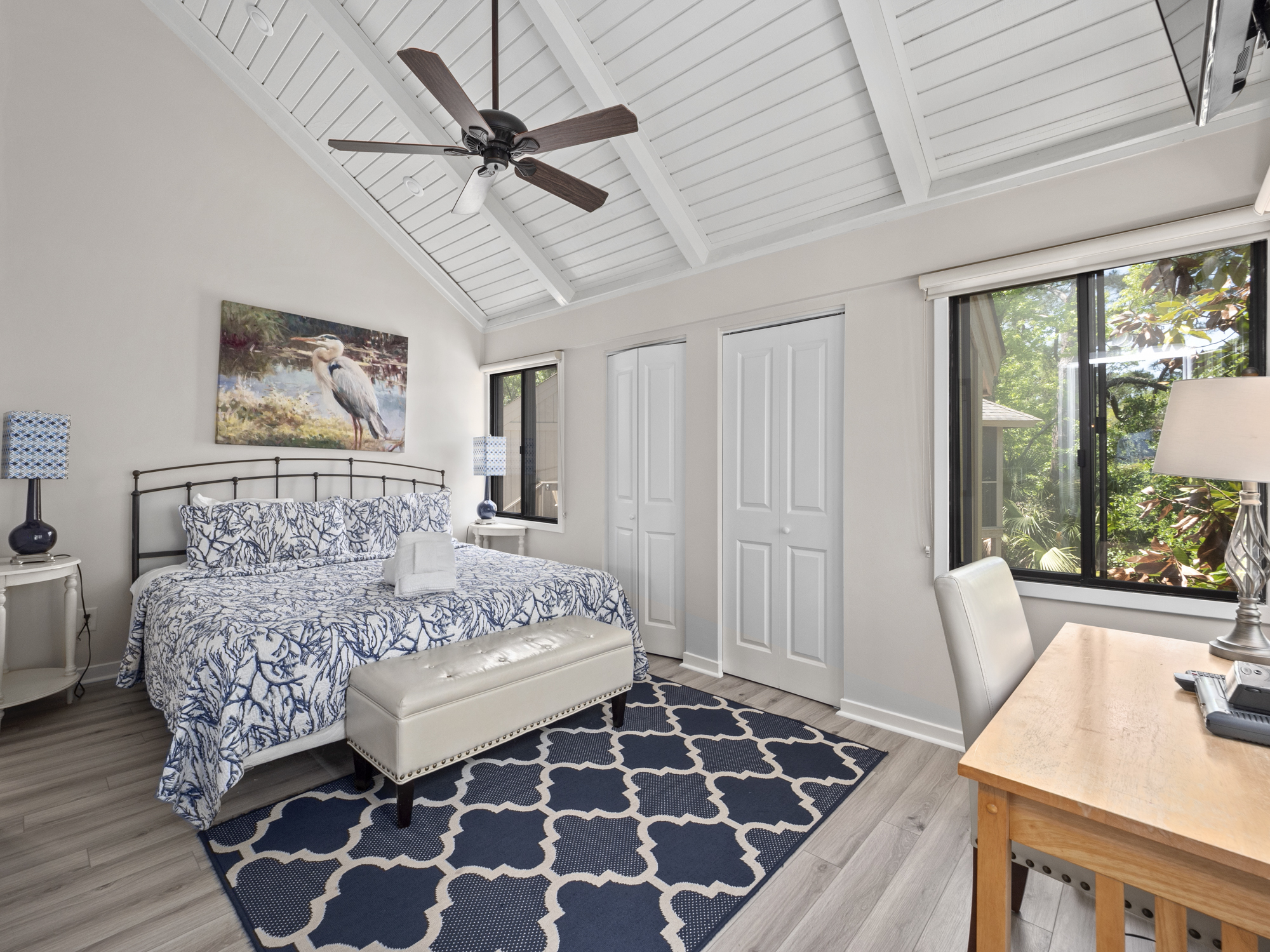 Master Bedroom with King bed, private bath, and flat screen TV