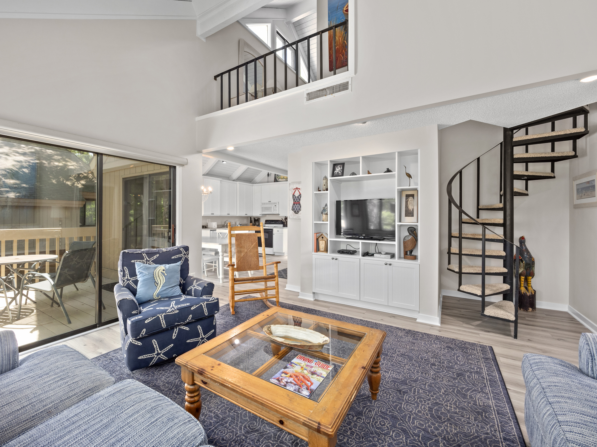 Living room with stairway to loft