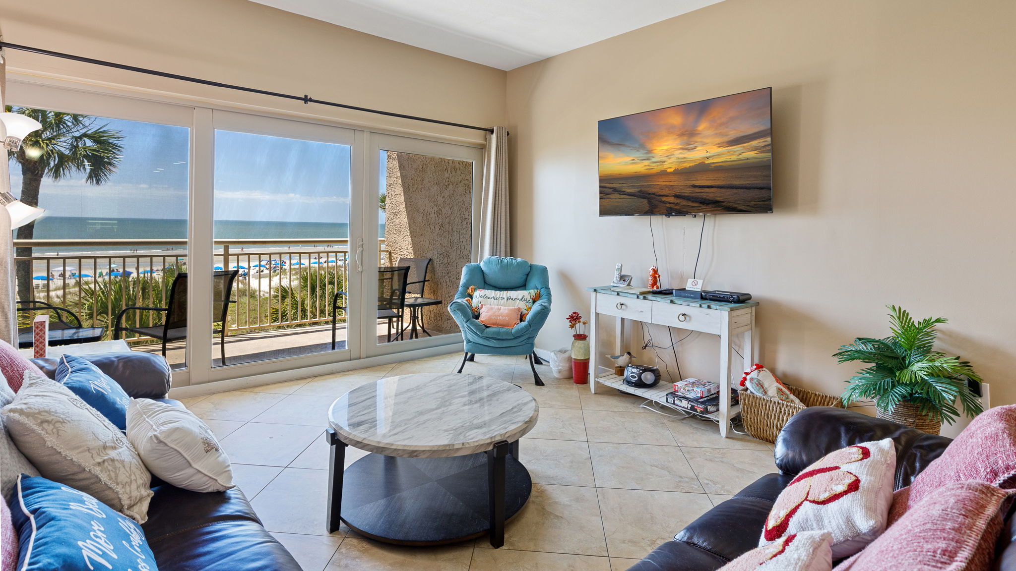 Living Room with Flat Screen TV and Private Balcony