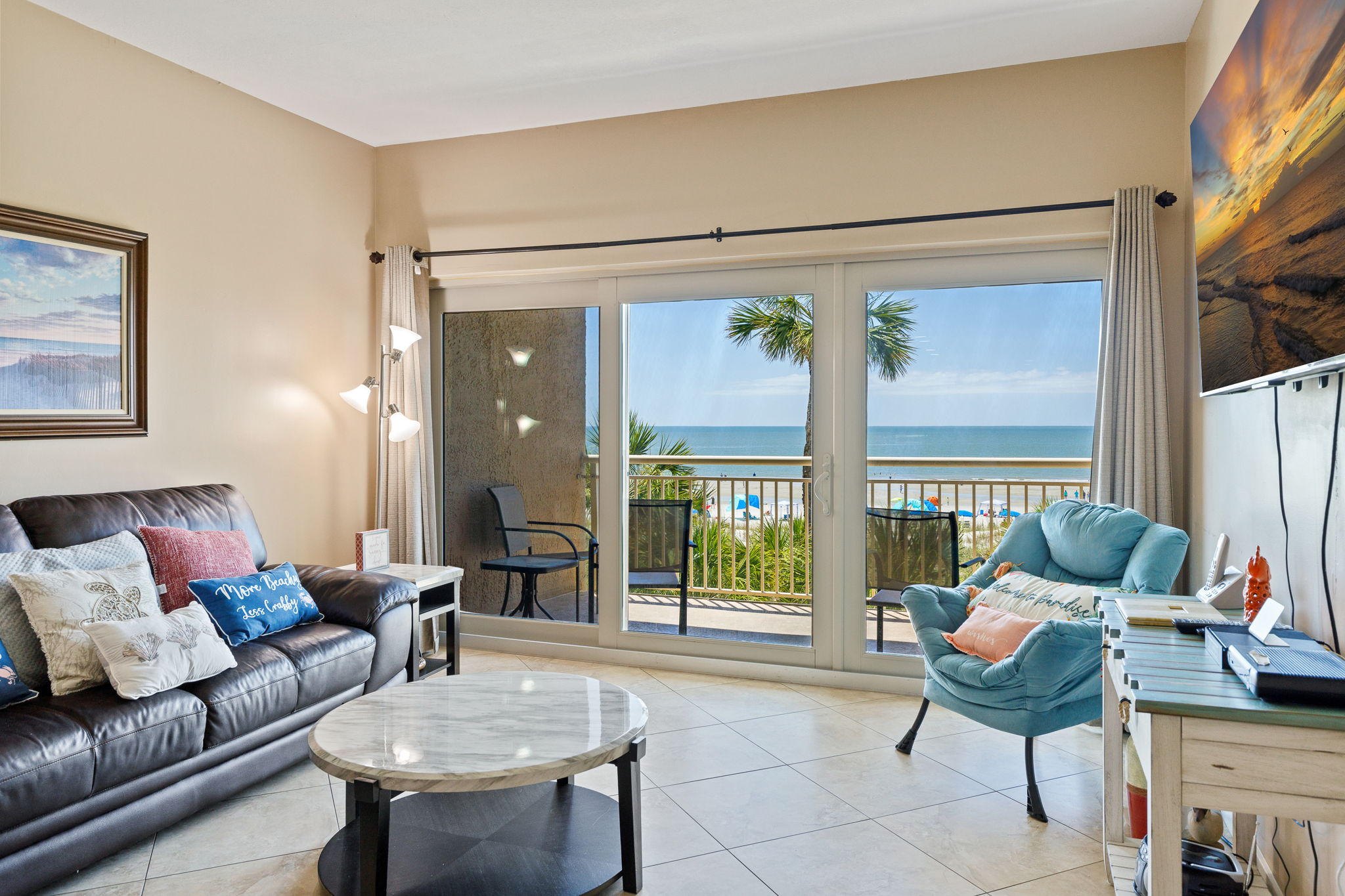 Living Room with Flat Screen TV and Private Balcony