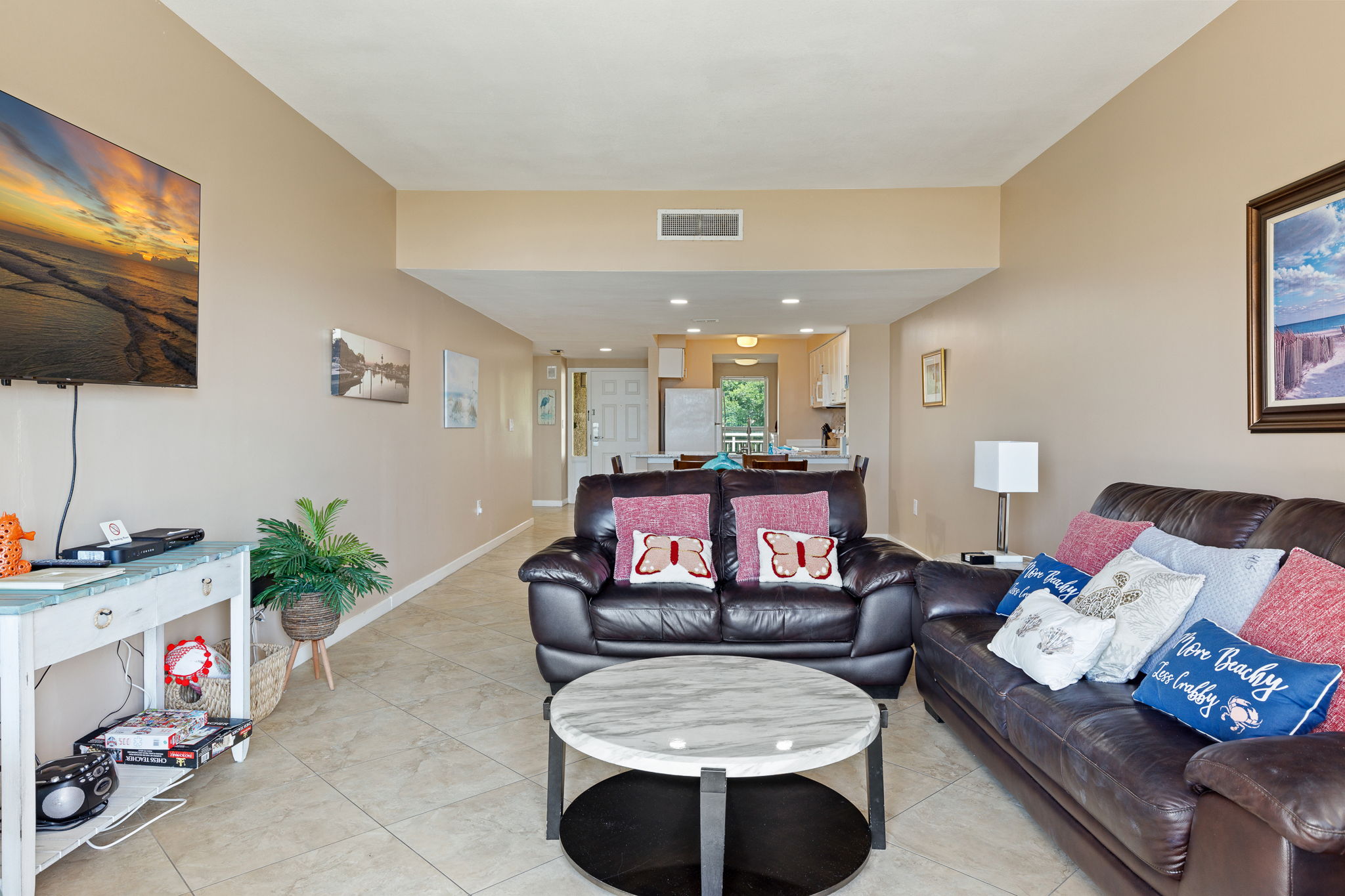 Living Room with Flat Screen TV and Private Balcony