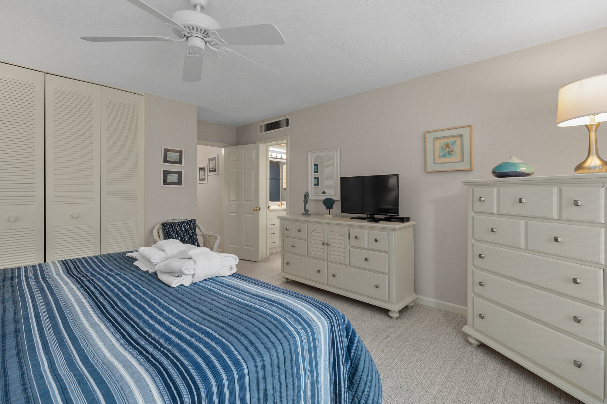 Master Bedroom with King Bed, Flat Screen TV, and Private Bath