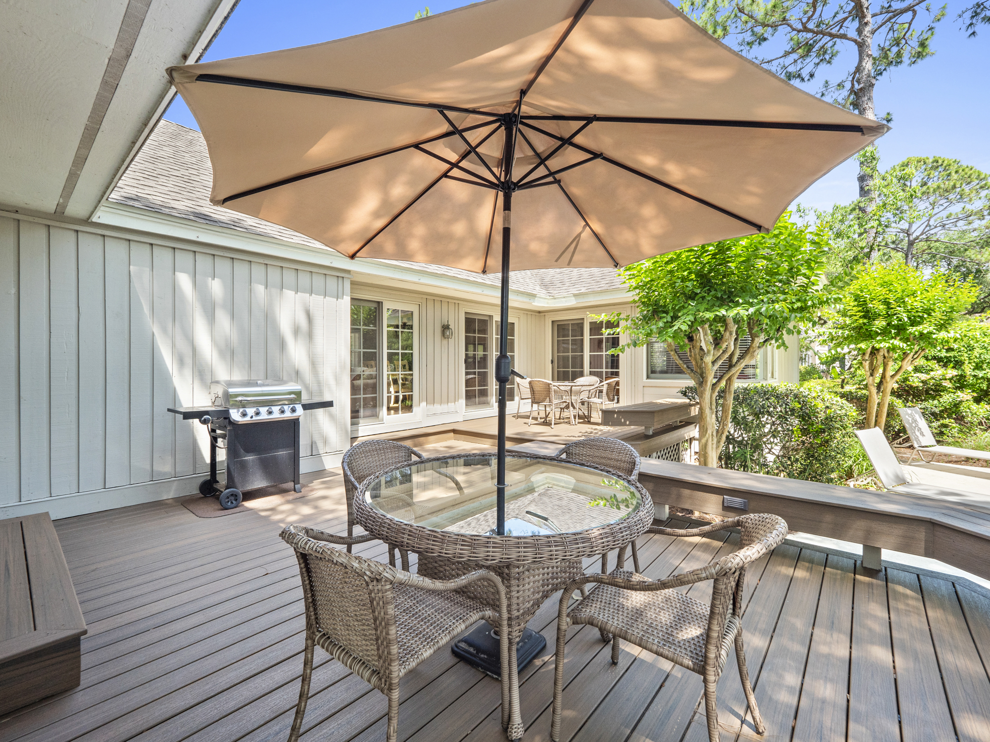 Spacious back deck overlooking pool and lagoon