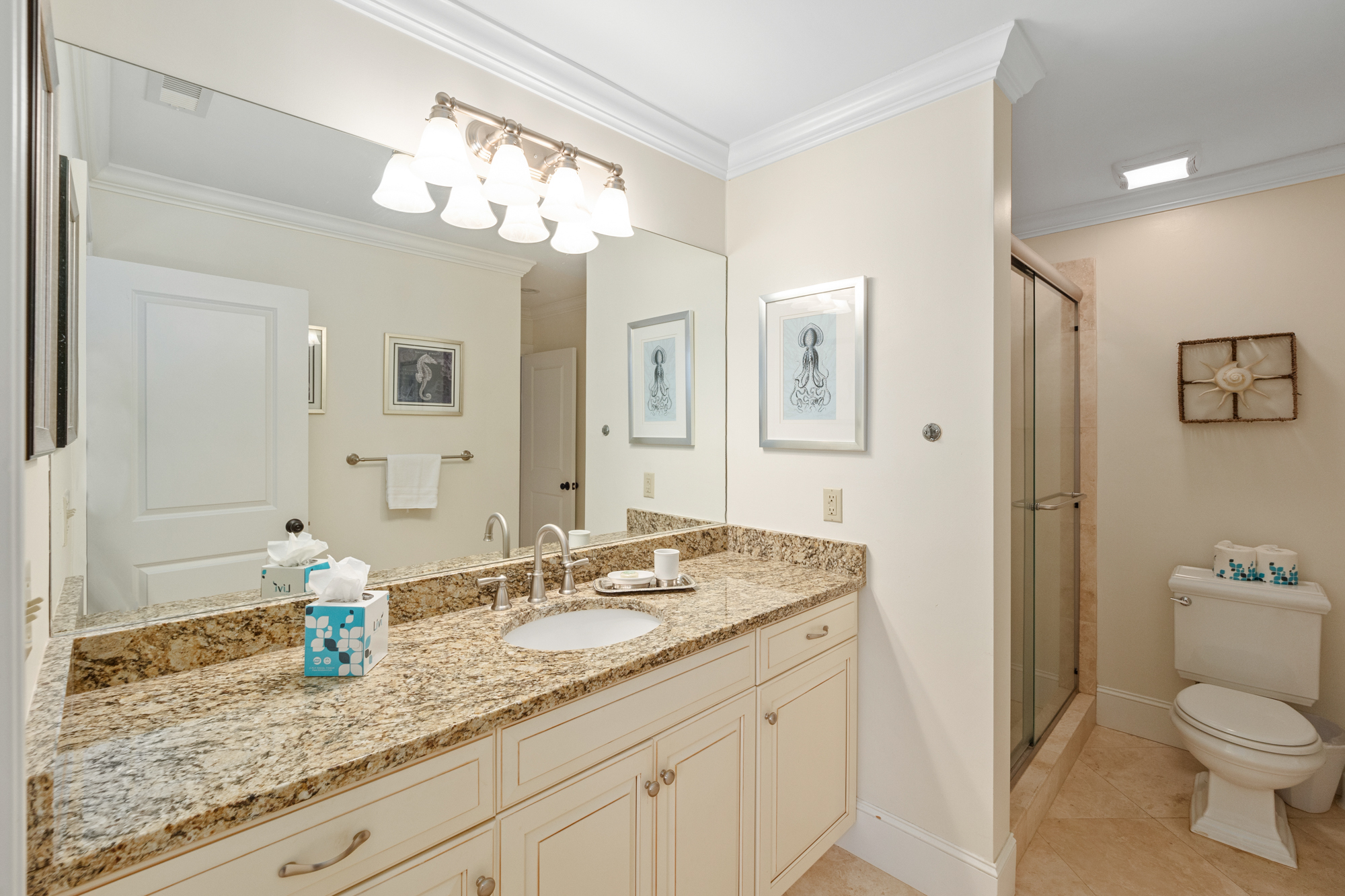 Shared bath between bedroom 3 and main living area