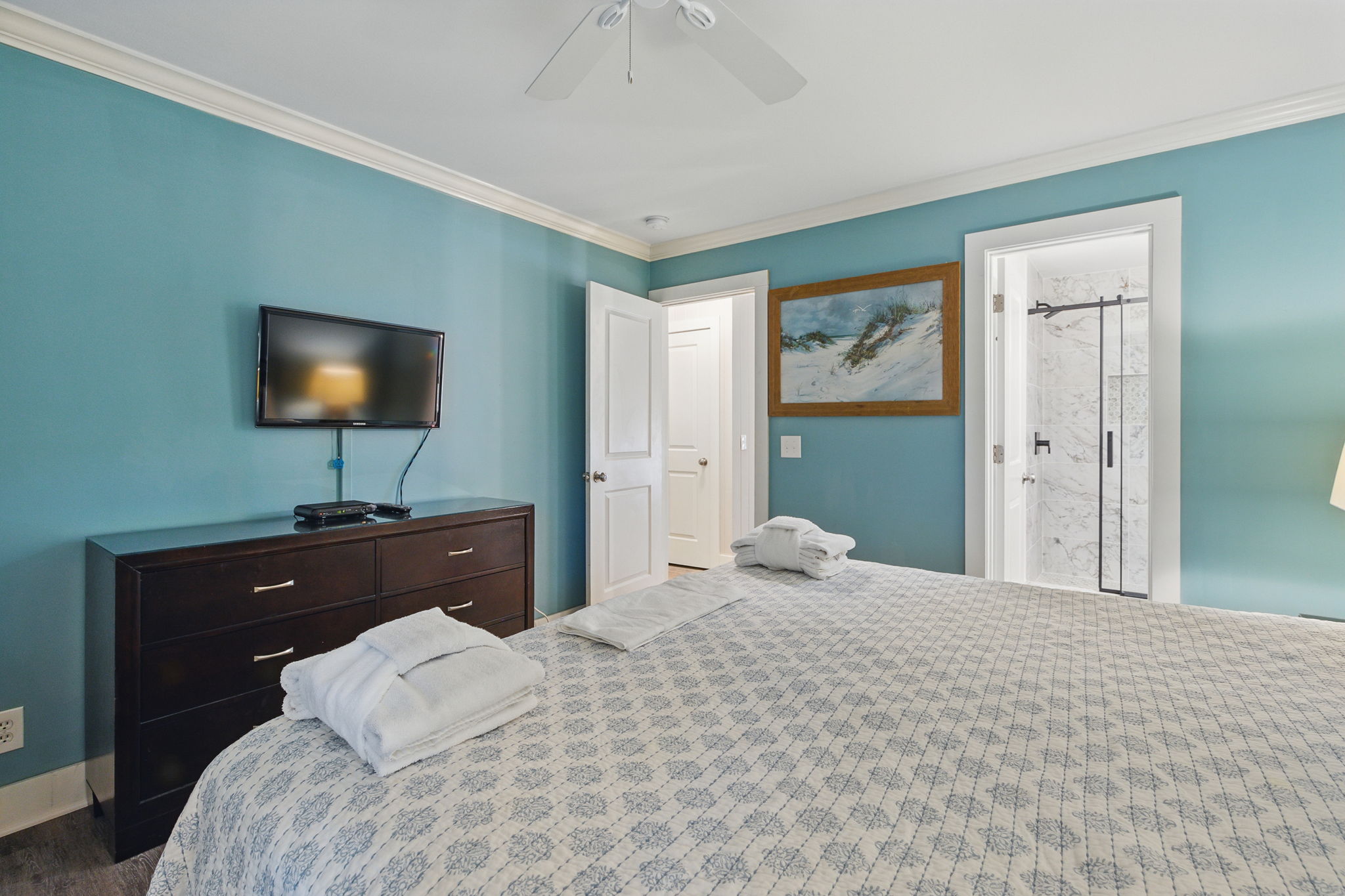 Bedroom 2 with King Bed, Flat Screen TV, and Private Bath