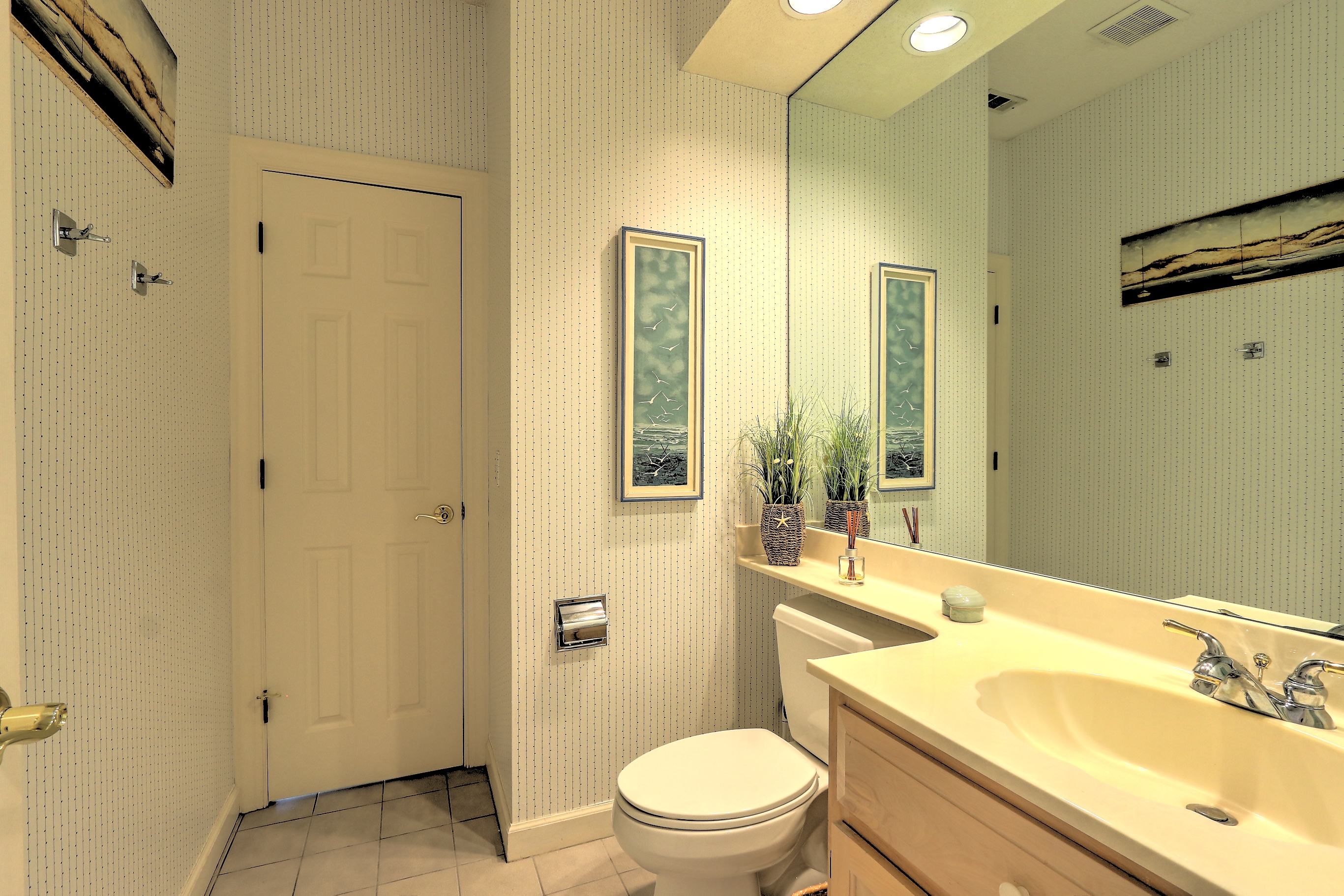 Half Bath off Kitchen and Foyer