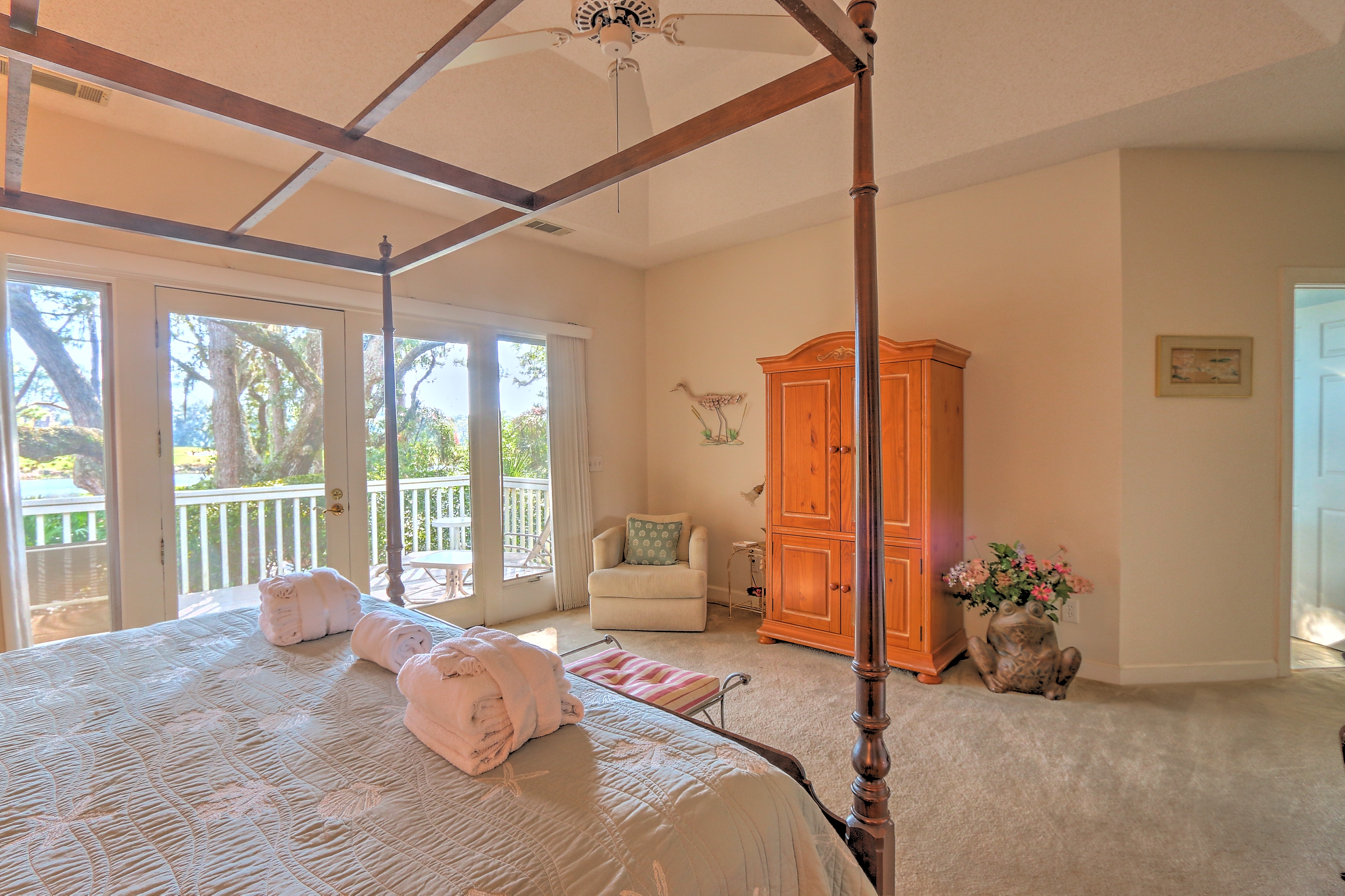 Master bedroom with King bed, flat screen TV, and private bath