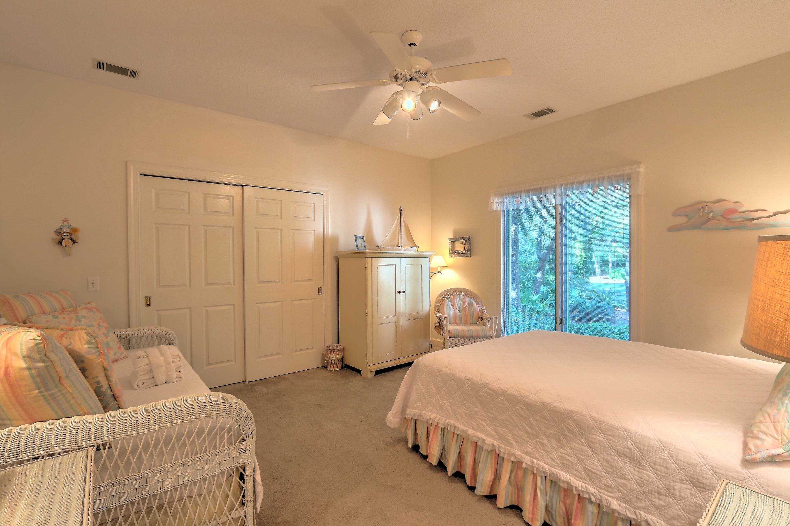 Bedroom 2 with Queen and Twin beds, Flat Screen TV, and a Shared