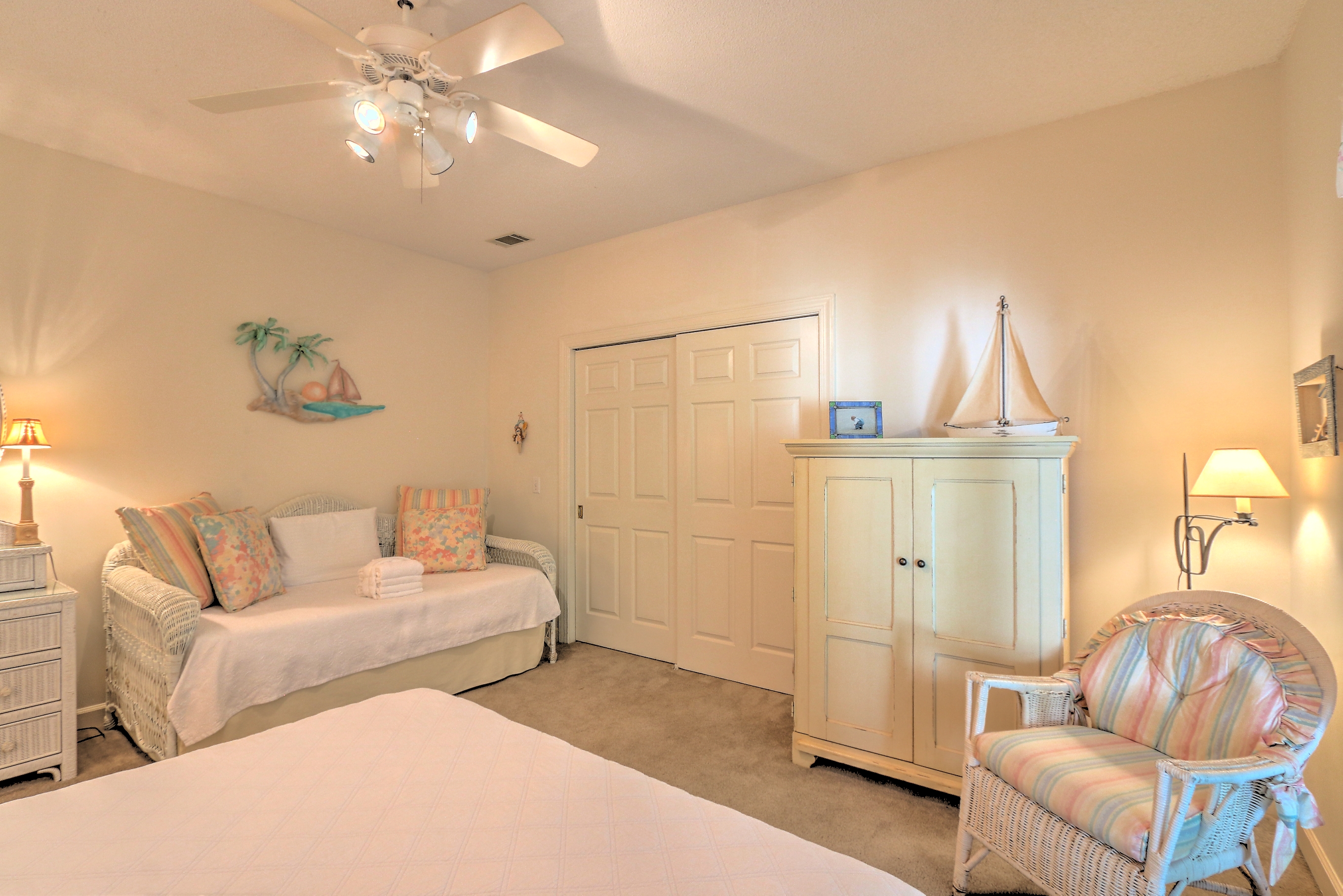 Bedroom 2 with Queen and Twin beds, Flat Screen TV, and a Shared