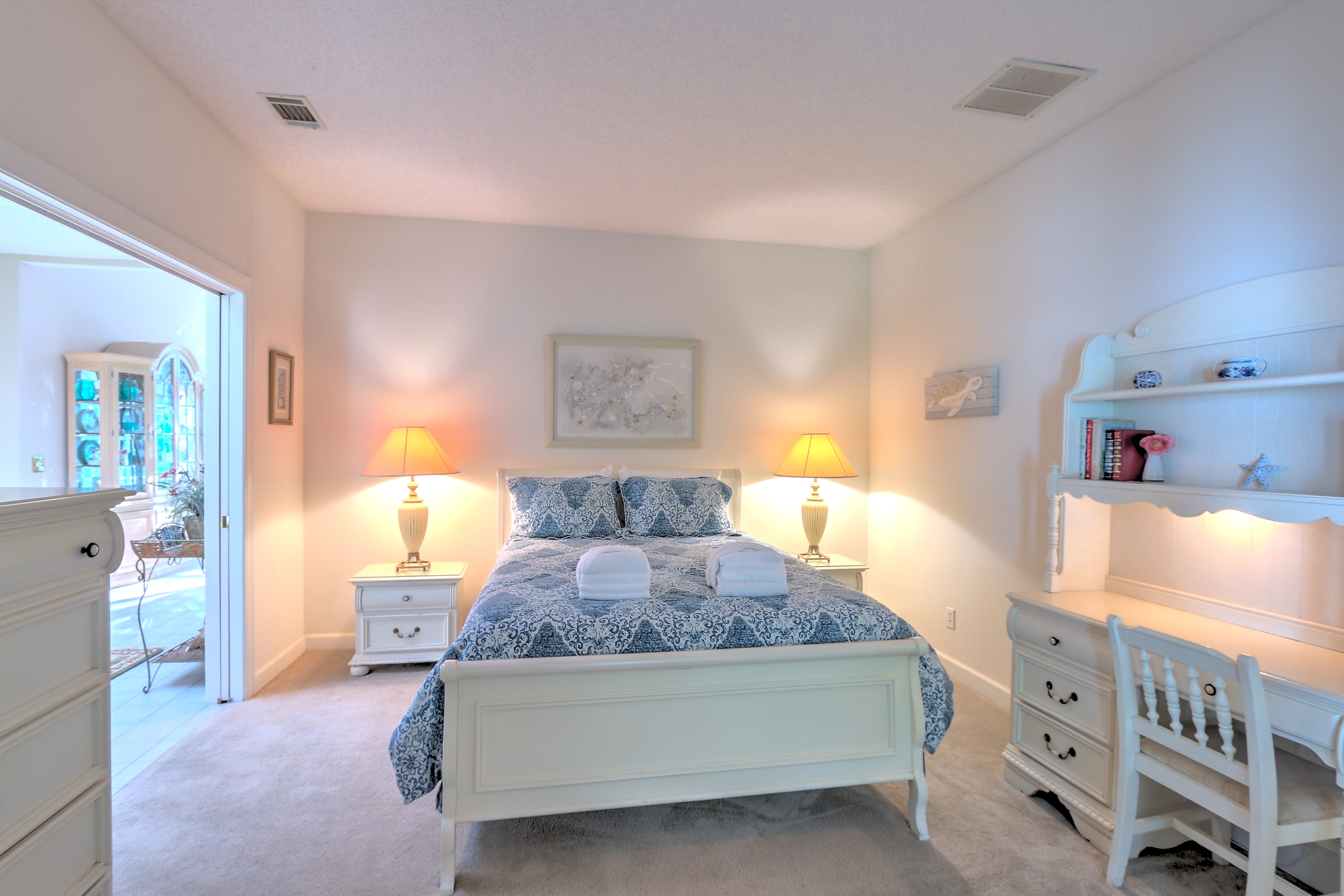 Bedroom 3 with Queen bed, flat screen TV, and a shared bath with