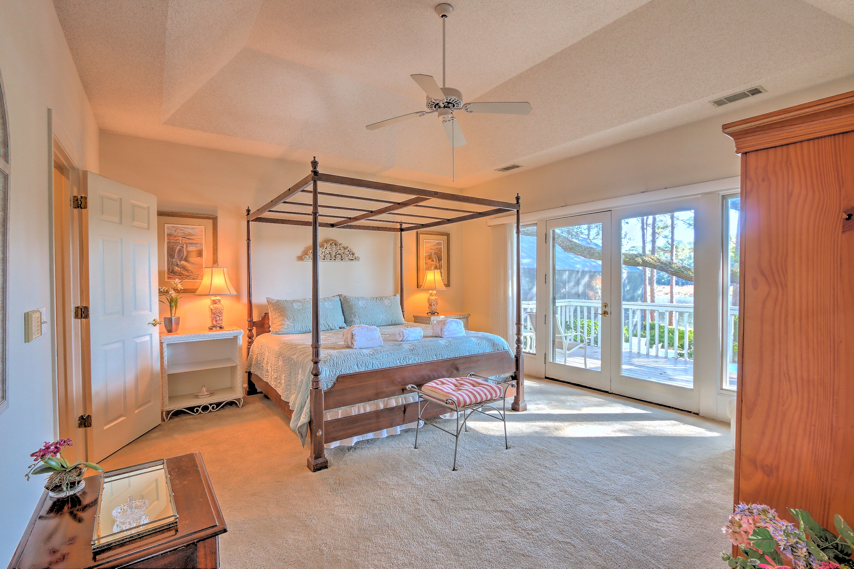 Master bedroom with King bed, flat screen TV, and private bath