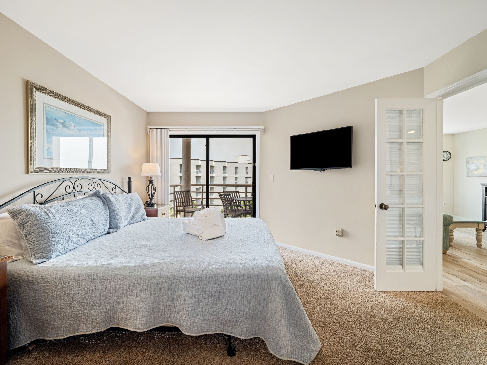 Master Bedroom with King Bed, Flat Screen TV and Private Balcony