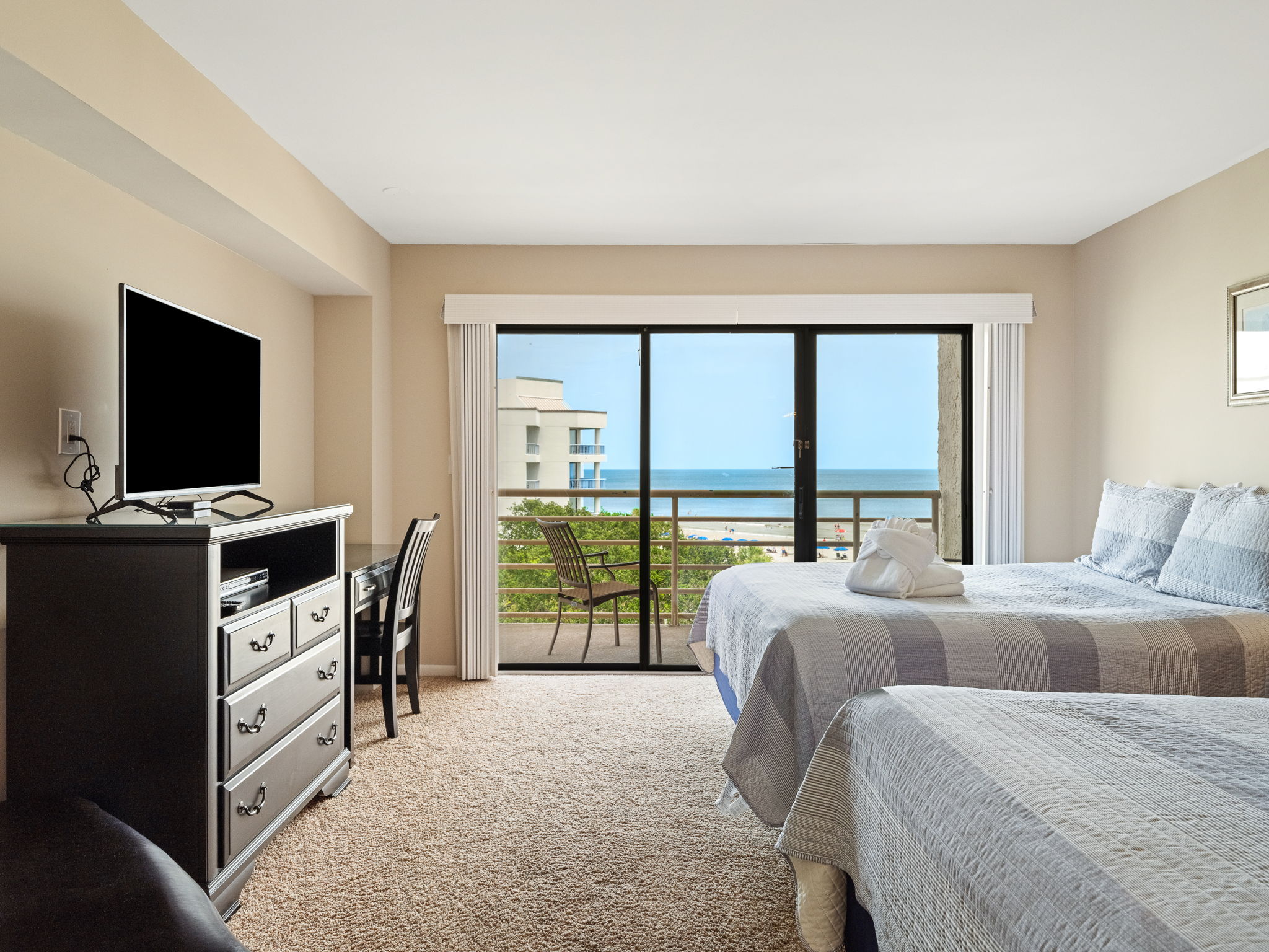 Bedroom 2 with Two Queens, Private Balcony, and Flat Screen TV