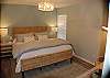 Spacious master suite with a king size bed