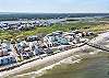 Located on the north end of Carolina Beach, where the island meets the peninsula. Walk to the pier for live music and drinks, take a stroll along the sandy shoreline, or enjoy a quick ride to the boardwalk.