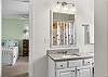 Jack and Jill bathroom shared between Bedrooms 2 and 3.