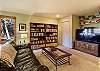 Media room with a Smart TV, movies, games and books