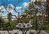 Private patio with waterview and lounge chairs