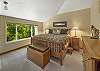 Primary King bedroom #1 with en suite bathroom and TV