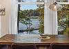 Dining table with a view of the water.