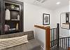 Sitting area upstairs, top of spiral staircase shown