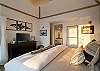 The primary King bed suite boasts a private deck and en suite bathroom.
