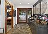 Elegant entry way with pivot hinge door 

*This house has an outside, front door security camera facing the parking area