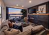 Living room with fireplace and picturesque sunset 