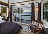 The Primary suite: Step out of your sliding glass door onto your private balcony overlooking the Salish Sea.